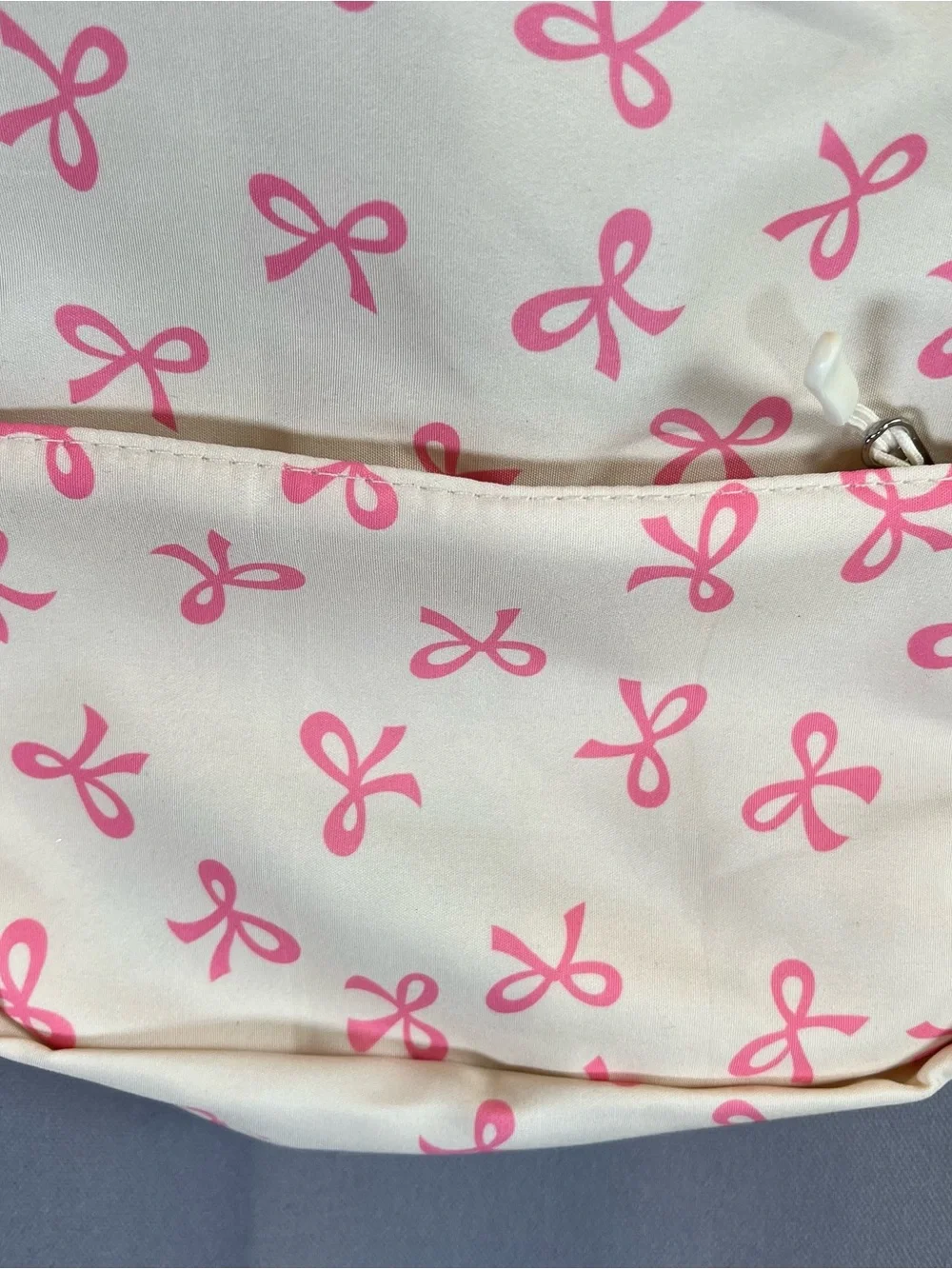 Cream Crossbody Bag w/ Pink Bow Print AdjustableStrap Top Zip & Front Zip Pocket